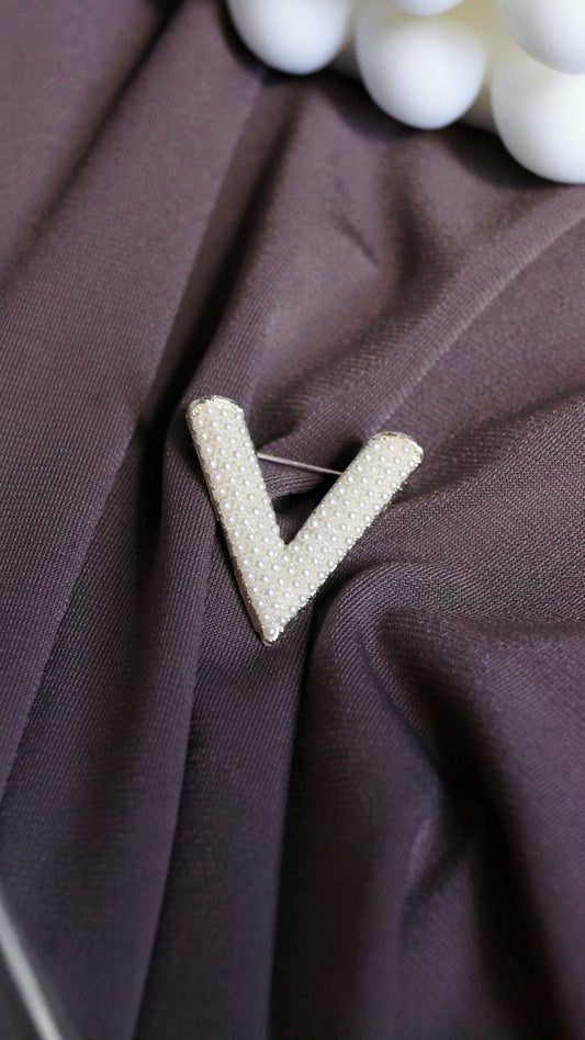 Broche "V"